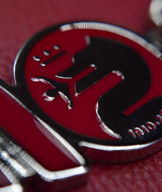Alfa Romeo 110th anniversary metal badge red