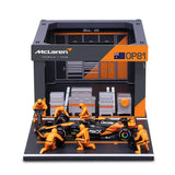 Bburago McLaren F1 1:43 model Oscar Piastri with pit garage
